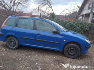 Masina Peugeot 206, an 2006, albastra.