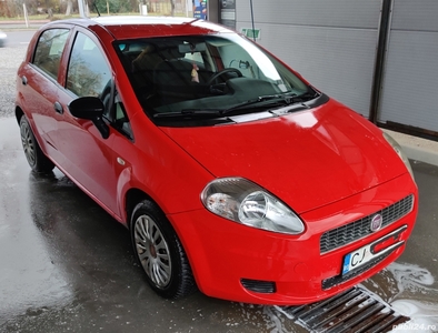 Fiat Grande Punto 1.4 benzină 77 CP Euro 4 AC geamuri electrice față cauciucuri vara iarna + altele