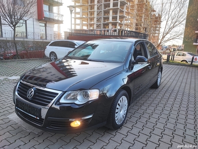 VW Passat; 2009; 1.6 benzina