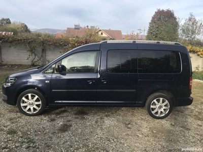 Vand VW Caddy Maxi 2,0 TDI 7 locuri sau schimb cu Caddy 5 locuri dotari similare plus diferenta