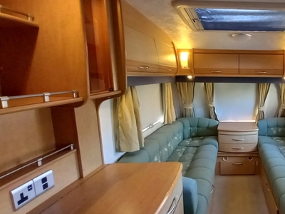 Rulota Coachman + an 2005