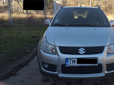 Vand Suzuki SX4 tractiune 4X4 1,6 Benzina 2008