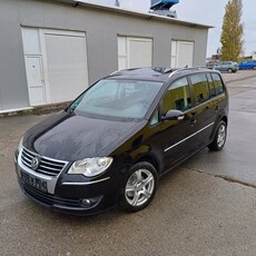 Vw touran 2.0 tdi bmm 1 ax 140 cai,navi,clima,trapa Import Germania