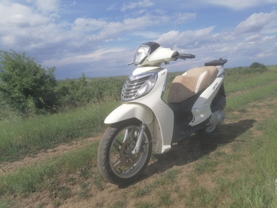 Scuter malaguti centro125 cc.