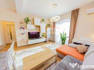 Apartament cochet cu curte si loc de parcare, confort lux