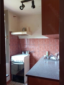 Apartament in bloc mansardat