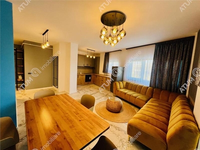 De vanzare apartament modern cu 3 camere decomandate 2 bai si balcon etajul 1 zona Piata Cluj