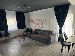 Chirie parter - Apartament 2 camere 64 mp cu curte proprie.