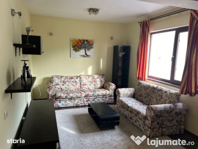 Apartament in bloc butique cu parcare si curte privata, met