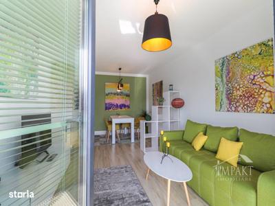 Amenajare relaxată și colorată într-un apartament de 2 camere din Cluj