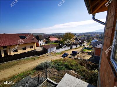 Casa cu 5 camere 2 bai si 260 mp teren in Cisnadie langa Sibiu