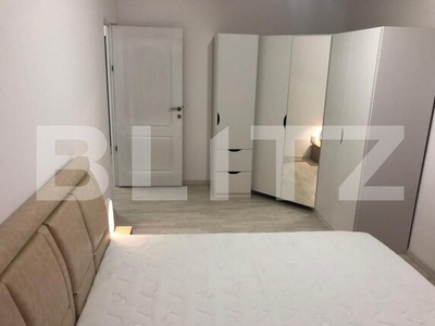 Apartament 2 camere decomandate, etaj intermediar, 55 mp, zona Dambu Rotund