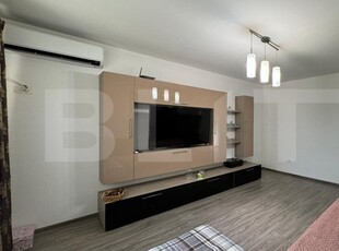 Casă în regim P+E+M, 130 mp², curte privată, zona Romanești