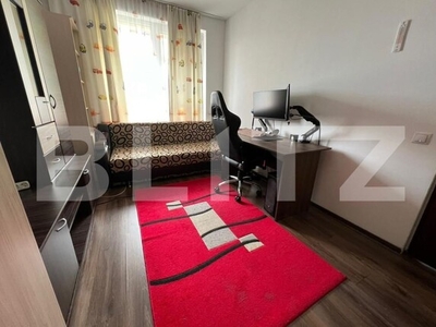 Apartament cu o camera, decomandat, etaj intermediar, Floresti