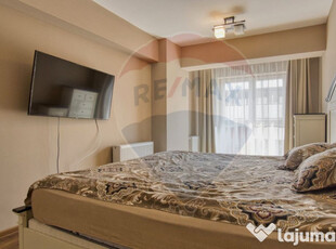 Apartament modern, 4 camere, cu terasă, boxă și loc de...