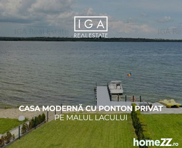 Casa moderna cu ponton privat pe malul lacului
