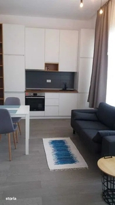 Închiriază un studio modern cu facilități premium și intrare privată