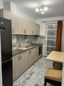 Apartament cu 2 camere, balcon, parcare subterana, etaj intermediar, bloc nou