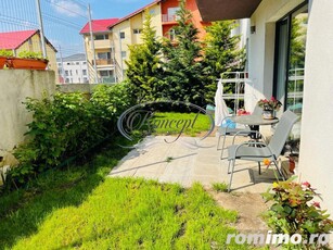 Apartament cu gradina si parcare