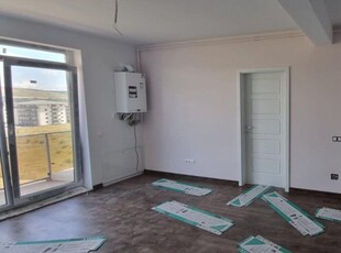 Apartament finisat cu 3 camere,55 mp,incalzire in pardoseala,zona Terra