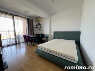 Apartament tip studio terasa 20 m, parcare la subteran, perfect investitie