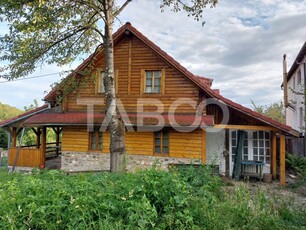 Casa de vacanta structura caramida si lemn 105 mpu 723 teren Tocile