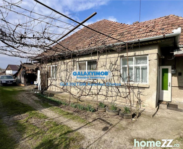 Casa cu 3 camere suprafata 80mp si teren 1000 mp.