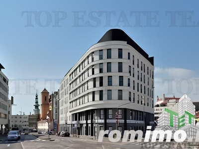 Hotel + spatii comerciale