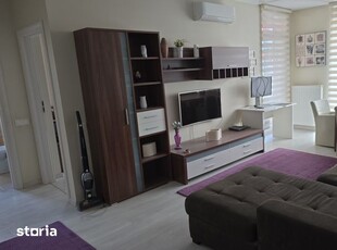 Dau in chirie apartament cu 2 camere lux