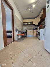 Apartament o camera, de vanzare, decomandat, etajul 1, loc de parcare,