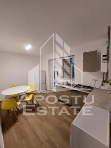 Apartament cu 2 camere, curte proprie, situat in zona Mosnita Veche