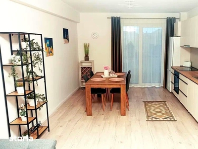 Apartament la casa cu 3 camere si teren zona - Piata Cluj