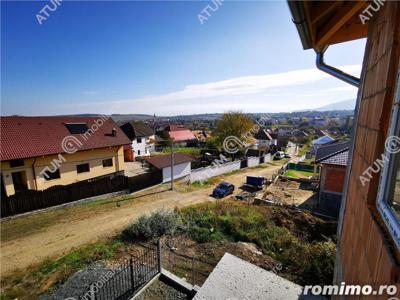 Casa cu 5 camere 2 bai si 260 mp teren in Cisnadie langa Sibiu