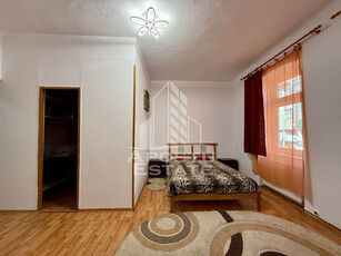 Apartament cu o camera la casa