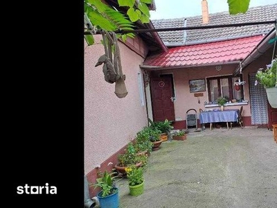 Casa Comanesti cu teren total de 1500 (intravilan)+6000m2 [extravilan)