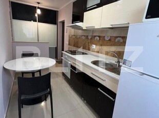 Apartament 2 camere, decomandat, modern, 47 mp, parcare, zona Florilor