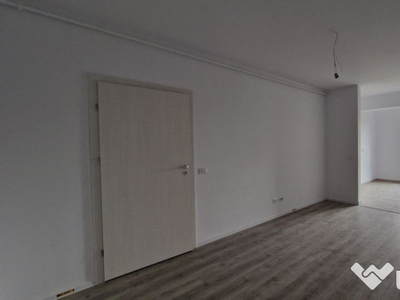 2 camere, bucatarie open space, curte proprie 52.1 mp