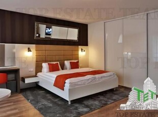 Hotel + spatii comerciale