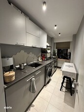 Apartament 3 camere Baciu etaj 2 cu o parcare acoperita si un garaj