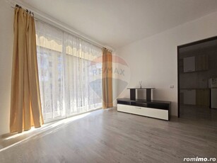 Apartament cu o camera de vânzare si loc de parcare, Floresti