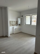 Duplex pe parter,cu 3 camere si 2 bai, la asfalt, zona linistita