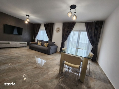 Apartament cu 3 camere semidecomandat situat in Podu Ros