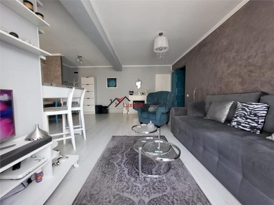 Apartament cu 3 camere, mobilat si utilat 77 mp utili si 2 balcoane. Etaj intermediar si parcare cu CF.