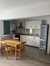 Apartament 2 camere, mobilat complet, cu loc de parcare.