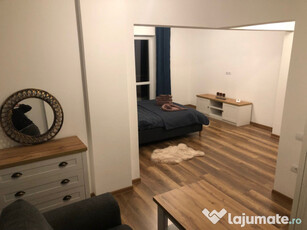 Apartament cu patru camere ,mobilat si utilat.