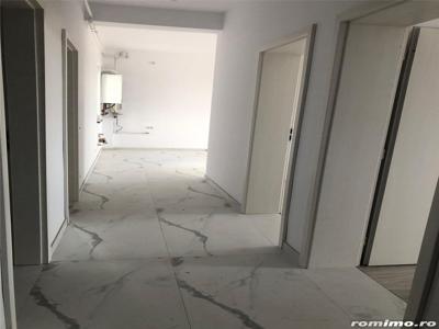 Apartament cu 3 camere decomandat 2 bai + o terasa de 20 mp