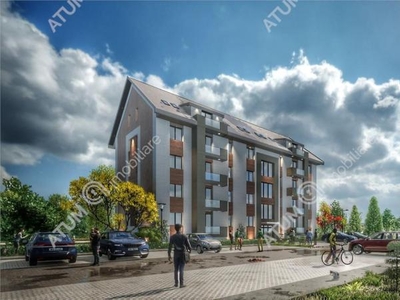 De vanzare apartament la cheie cu 3 camere decomandate 2 bai balcon si loc de parcare situat in Talmaciu/ Sibiu