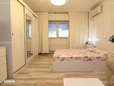 apartament cu 3 camere decomandate,2 bai,1balcon si 2 boxe