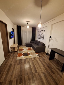 Apartament nou 2 camere cu curte de 70 mp., zona Calea Cisnadiei