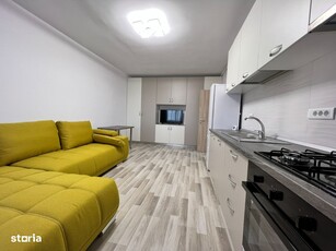 Apartament de inchiriat superb mobilat cu centrala, parcare, bloc nou